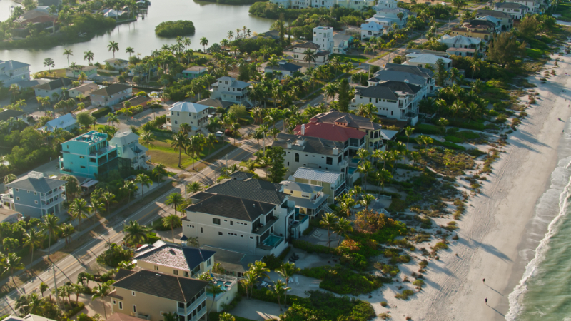 Aerial shot of Bonita Springs, Florida on a clear sunny morning in spring. Bonita Springs is a coastal town between Naples and Fort Myers, with the nickname "Gateway to the Gulf".